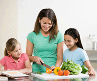 parents cooking healthy recipes for family